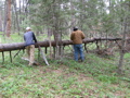 Cutting a tree on the fence line